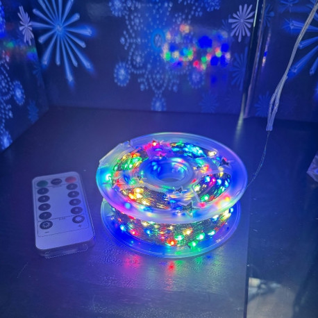 Гірлянда Роса 1000LED 100м на катушці з пультом, 220В, зелений дріт, колір RGB мультик